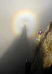[Terry Gifford, Mark Vallance and a Brocken Spectre on Reade's Route (220ft V Diff, 3-star classic), Crib Goch Buttress., 1 kb]