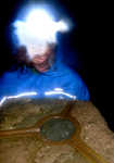 [Sally Wheatley, using the TIKKA XP² at the trig point on Helvellyn during a dark and stormy night in December., 2 kb]