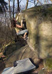 [Sarah Burmester climbing a classic Font 7A on the Trio boulder at Petrohrad., 3 kb]