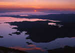 [sun setting between Rum and Skye, from Rois-bheinn, 1 kb]
