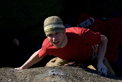 Pete Robins making the first ground-up ascent (4th overall ascent) of The Promise (E7) at Burbage North  © Alan James