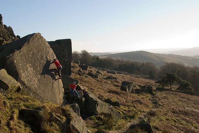 Boulderers above the popular path up from the Plantation car park - currently the only paid parking at Stanage  © Alan James - Rockfax