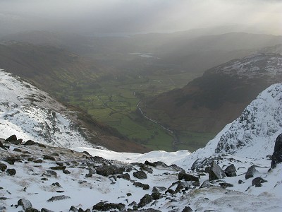 Walking across to Harrison Stickle - winds about 60mph and snowing  © Michael Ryan