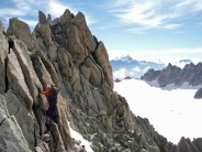 Approaching the Summit of Aiguille du Tour with Grand Combin in the background