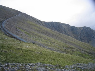 The Snowdon railway running above the cliffs of Clogwyn Coch - Cloggy on the right  © John S Turner  - geograph.org.uk