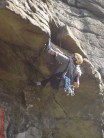 Jay demonstrating his flexibility on an overhang at Haytor