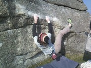 Jon attempting boulder problem at Bonehill Boulders