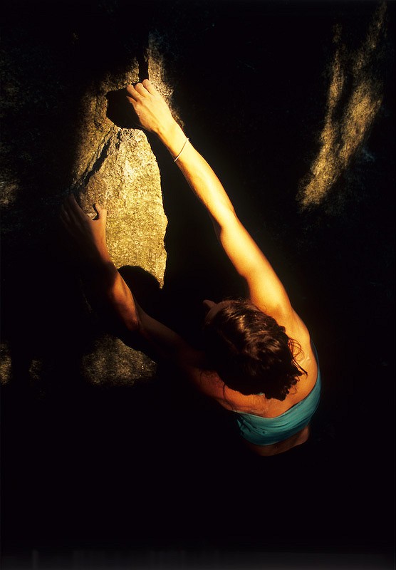 Jacky Moore warming up, Squamish boulders, Canada