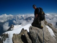 Tom sat on the top of Mont Maudit