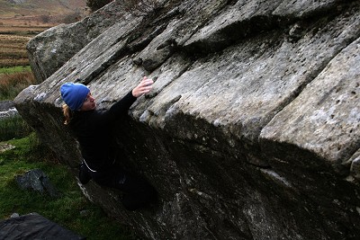 Rachael Hinchliffe (MLTUK) bouldering at the RAC Boulders, North Wales  © Jack Geldard