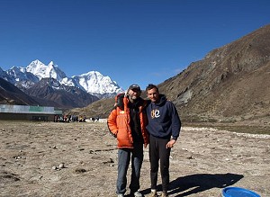 Ran Fiennes and Kenton Cool waiting for a helicopter ride to Kathmandu  © Kenton Cool / Dream Guides