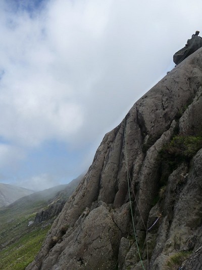 Topping out on Tennis Shoe with cloud spilling out of Cwm Cneifion.  © allysingo