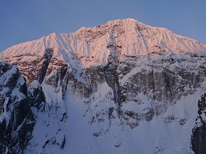 The 1200m north face of Mt Church . Amazing Grace  takes the ice streaks through the rockband just left-of-centre  © Gavin Pike