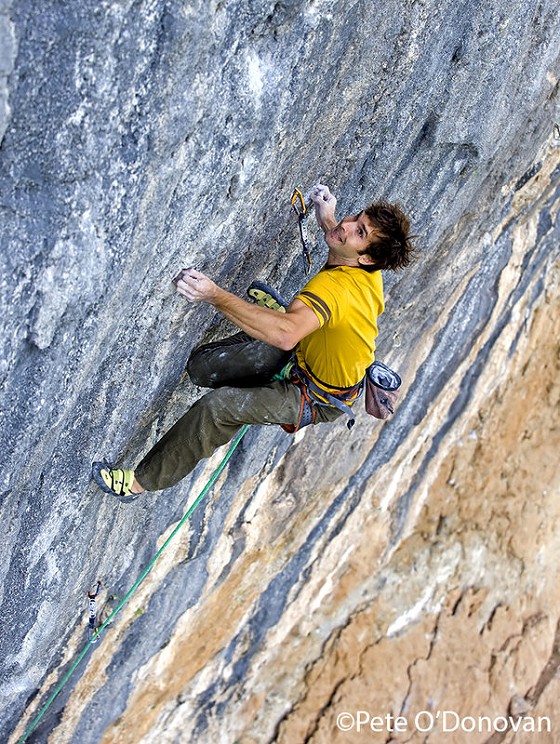 Chris Sharma, seen here in action on his route, ‘Pachamama’ (9a+/b) at Oliana  © Pete O'Donovan 2009