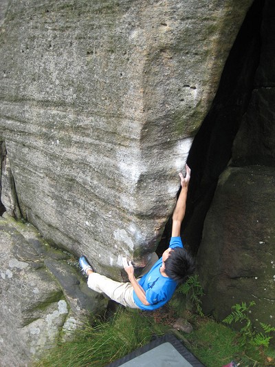Toru Nakajima climbing Help the Aged, V6,  at Stanage  © Tom Randall