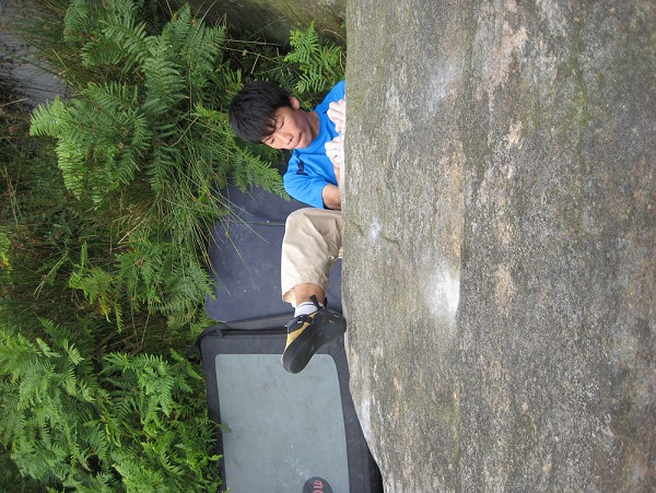Toru Nakajima climbing the Victorian Overmantel, V9, Stanage  © Tom Randall