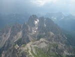 Storms all around from the top of Cime Grande, after West Face (Dulfer)