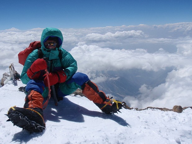 R Allen on the summit of Nanga Parabt  © Sandy Allan