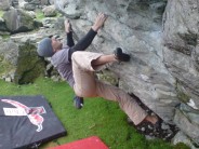 Tom Silsbury hooking hell out of Ding Dong's Traverse V8 Sheep Pen Boulders