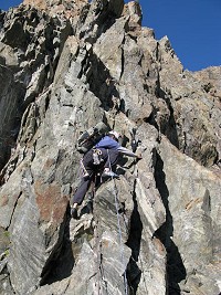 Duncan Tunstall climbing the ridge as the rock improves on day 2  © Simon Richardson