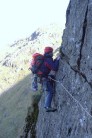 Peter White on the hand traverse of Corvus, Diff, Raven Crag