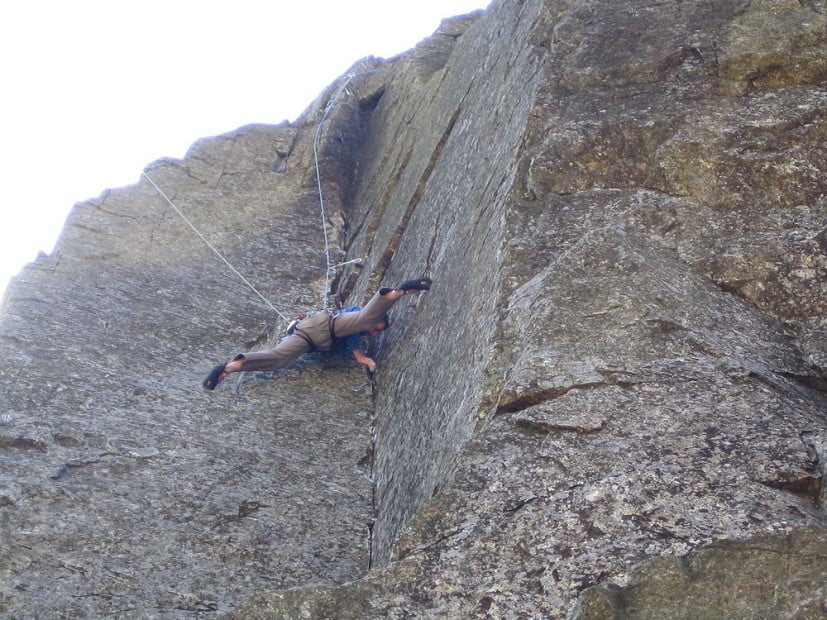 Wes Hunter stretching a youthful groin on one of the harder E4 routes around.Lost Horizons on the East Buttress.  © robmatheson