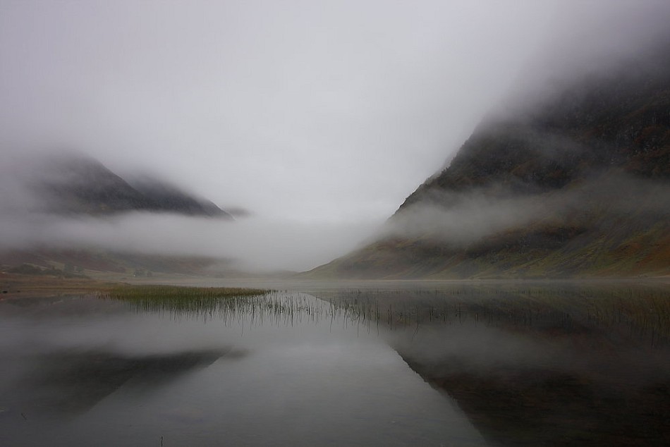 Loch Achtriochtan in Glencoe and Aonach Eagach Ridge shrouded in Autumn mist.  © JCameron