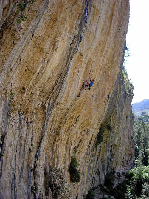 Neil Mawson on Dosis F8b+ at the Wild Side in Sella, Spain. A route which he climbed last April.  © Ruth Smitton