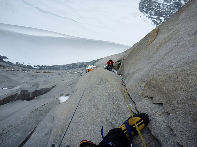 Pete Rhodes aiding pitch 14 looking down at George Ullrich on their previous expedition  © Pete Rhodes