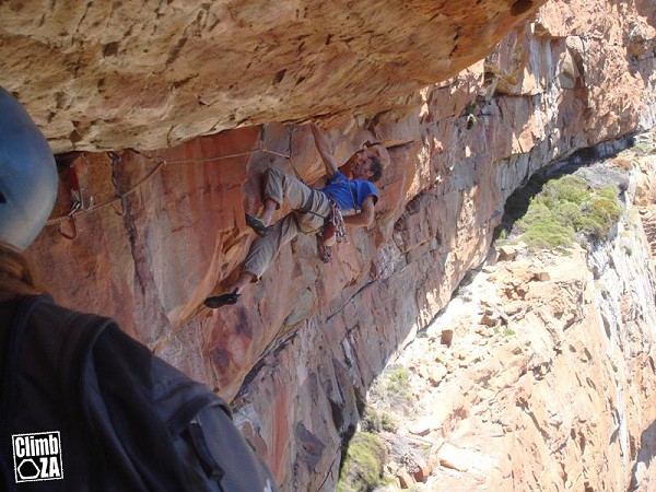 Dave Birkett chalking up on the crux roof of Remote Control  © Adam Roff