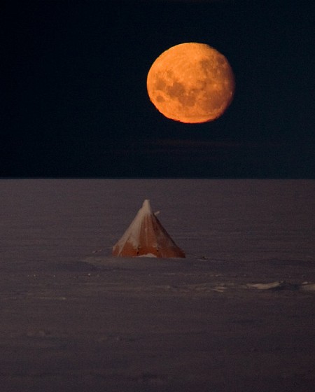 Antarctic pyramid Tent below a full moon  © British Antarctic Survey