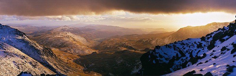 Looking west over from Bowfell's summit across the wild Upper Esk Valley  © Alastair Lee