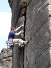 Andy Buckley laybacking on Right Unconquerable (HVS), Stanage Plantation