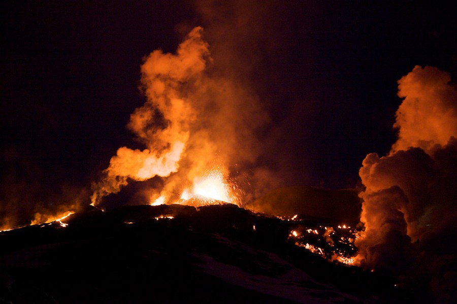 Fire and lava erupting from Eyjafjallajokull Glacier, Iceland.  © John Beatty and Jon Magnusson