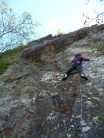 Julie in her element, vertical crimpy wall! Roadkill Recipes 7a