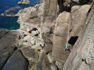 Jon climbing Sunny Corner Lane, Carn Barra - BMC International Sea Cliff Climbing Meet 2010