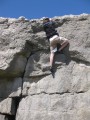Climbing excellent rock of Angel Dust (V0**)
