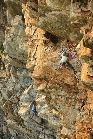 Lou Neill working hard to protect herself and her second on The Moon, E3 5c. Gogarth  © Mike Robertson