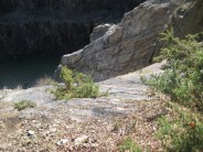 Looking down from the fixed rope at the top. the climb ends to the right of the photo and starts by the waters edge