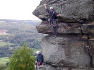 Bryan leads the top pitch of Valkyrie (HVS 5a)at Froggatt Edge, Derbyshire.
Andy waits to follow!