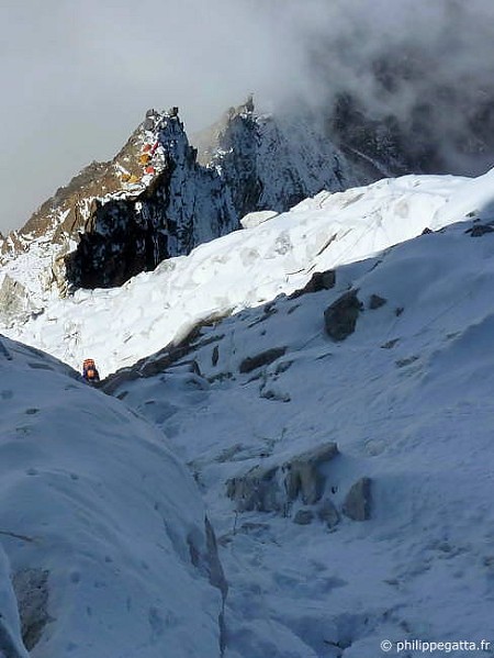 Jean-Marc in the mixed terrain at around 6100 m, C2 behind  © P. Gatta