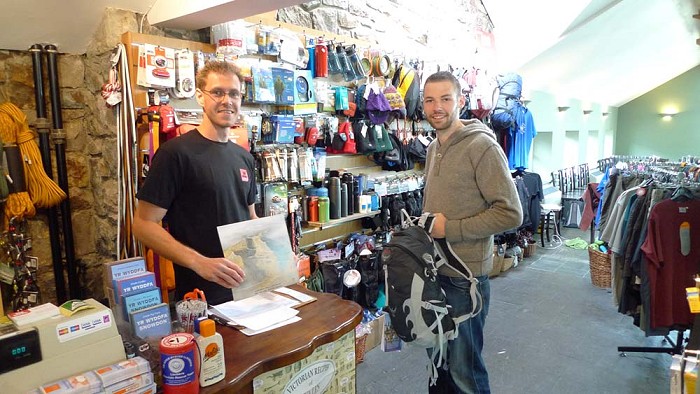 Jon Grigson at Joe Brown's Pen y Pass Shop visited by Jake Wiid from Osprey.  © Mick Ryan