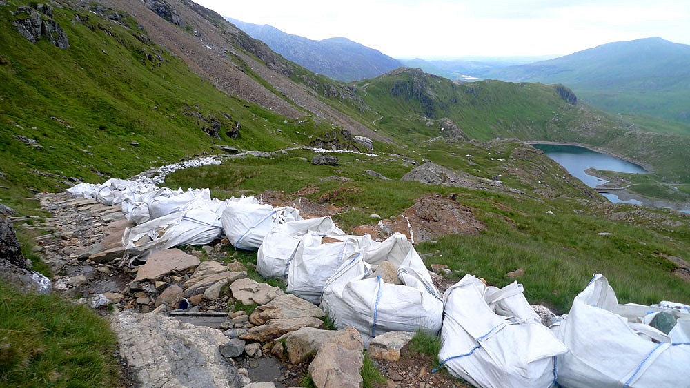 Bags of stone, helicoptered in for path restoration on the Pyg track, Snowdon  © Mick Ryan - UKClimbing.com