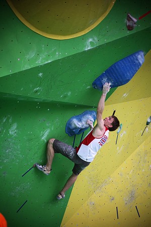 Stew Watson climbing his way to 12th place in the bouldering comp.  © Jack Geldard / UKC