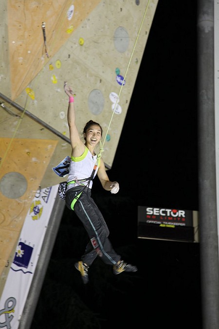 Kim Jain with a big smile after winning the women's lead comp  © UKC News