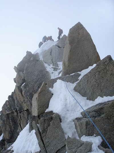 Climbers on the first abseil  © David Millington