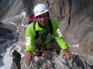 Me on the Thumb, Dolomites (Sella area) complete with wonky helmet. Superb route, horrible descent