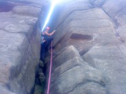me climbing devils chimney at stanage