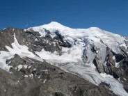The Weissmies, Trift Glacier and Hohsaas Hut as seen from the Jegihorn.