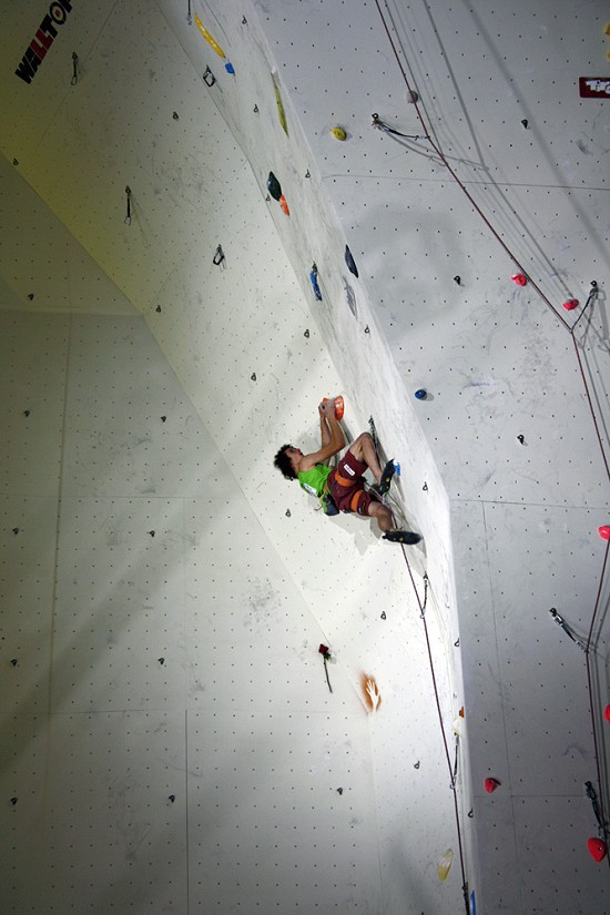 Adam Ondra climbing to second place in the men's lead competition  © Sarah Burmester